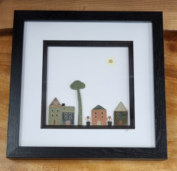 Yvonne Fleming Pottery Houses in Black Frame Medium Daylight
