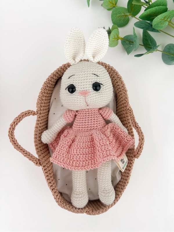Cuddly bunny in a basket